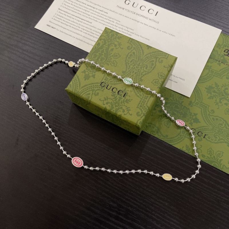 G*u*i necklaces